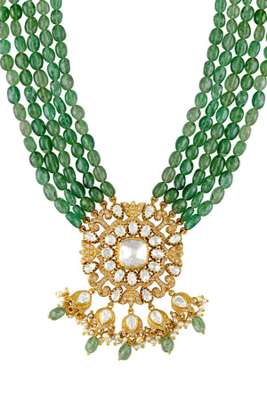 Buy green stone strings necklace online in USA with gold plated pendant. Elevate your traditional look with royal Amrapali jewelry, silver plated jewelry, gold plated jewelry, gold plated necklace, silver earrings, silver bangles from Pure Elegance Indian fashion store in USA.-closeup