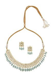 Buy gold plated white glass necklace set online in USA with aqua stones. Elevate your traditional look with royal Amrapali jewelry, silver plated jewelry, gold plated jewelry, gold plated necklace, silver earrings, silver bangles from Pure Elegance Indian fashion store in USA.-full view