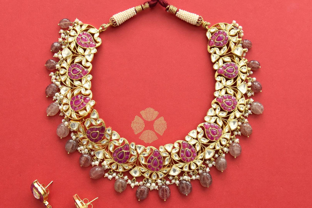 Buy stunning gold plated kundan jadau necklace set online in USA. Elevate your traditional look with royal Amrapali jewelry, silver plated jewelry, gold plated jewelry, gold plated necklace, silver earrings, silver bangles from Pure Elegance Indian fashion store in USA.-front