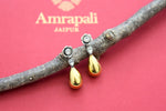 Shop silver tone earrings online in USA with gold plated drops. Elevate your traditional look with royal Amrapali jewelry, silver plated jewelry, gold plated jewelry, gold plated necklace, silver earrings, silver bangles from Pure Elegance Indian fashion store in USA.-front