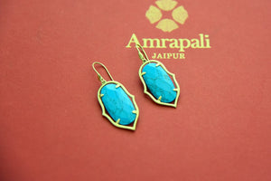 Shop gold plated earrings online in USA with turquoise stone. Elevate your traditional look with royal Amrapali jewelry, silver plated jewelry, gold plated jewelry, gold plated necklace, silver earrings, silver bangles from Pure Elegance Indian fashion store in USA.-front