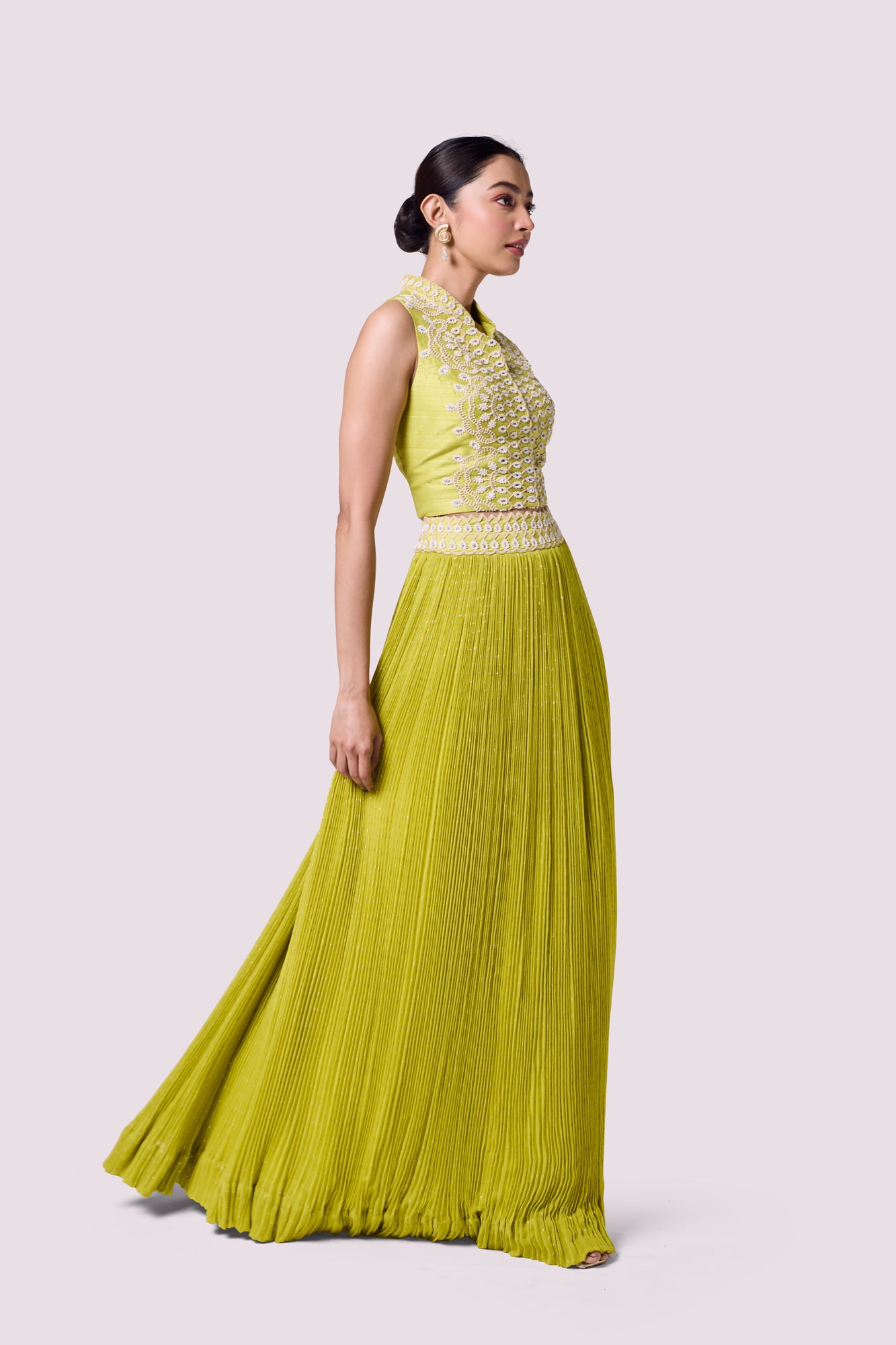 Buy stunning lime green embellished top with skirt online in USA. Shop the best and latest designs in embroidered sarees, designer sarees, Anarkali suit, lehengas, sharara suits for weddings and special occasions from Pure Elegance Indian fashion store in USA.-side