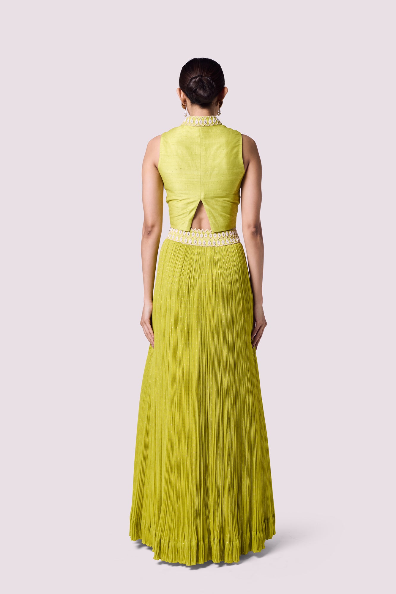 Buy stunning lime green embellished top with skirt online in USA. Shop the best and latest designs in embroidered sarees, designer sarees, Anarkali suit, lehengas, sharara suits for weddings and special occasions from Pure Elegance Indian fashion store in USA.-closeup