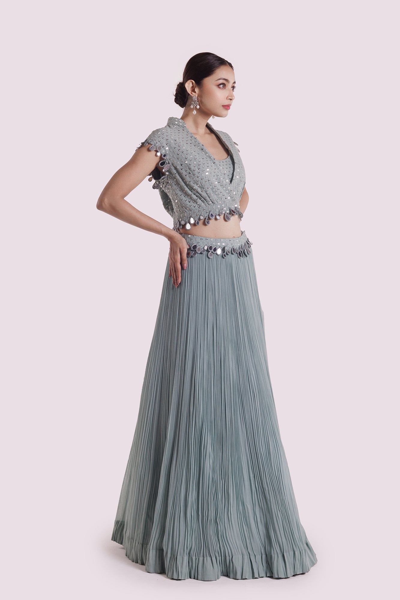 Shop stunning dusky blue mirror work skirt set online in USA. Shop the best and latest designs in embroidered sarees, designer sarees, Anarkali suit, lehengas, sharara suits for weddings and special occasions from Pure Elegance Indian fashion store in USA.-side