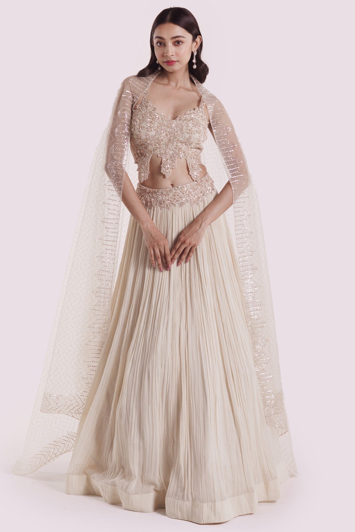 Shop ivory embroidered georgette lehenga with dupatta online in USA. Shop the best and latest designs in embroidered sarees, designer sarees, Anarkali suit, lehengas, sharara suits for weddings and special occasions from Pure Elegance Indian fashion store in USA.-full view