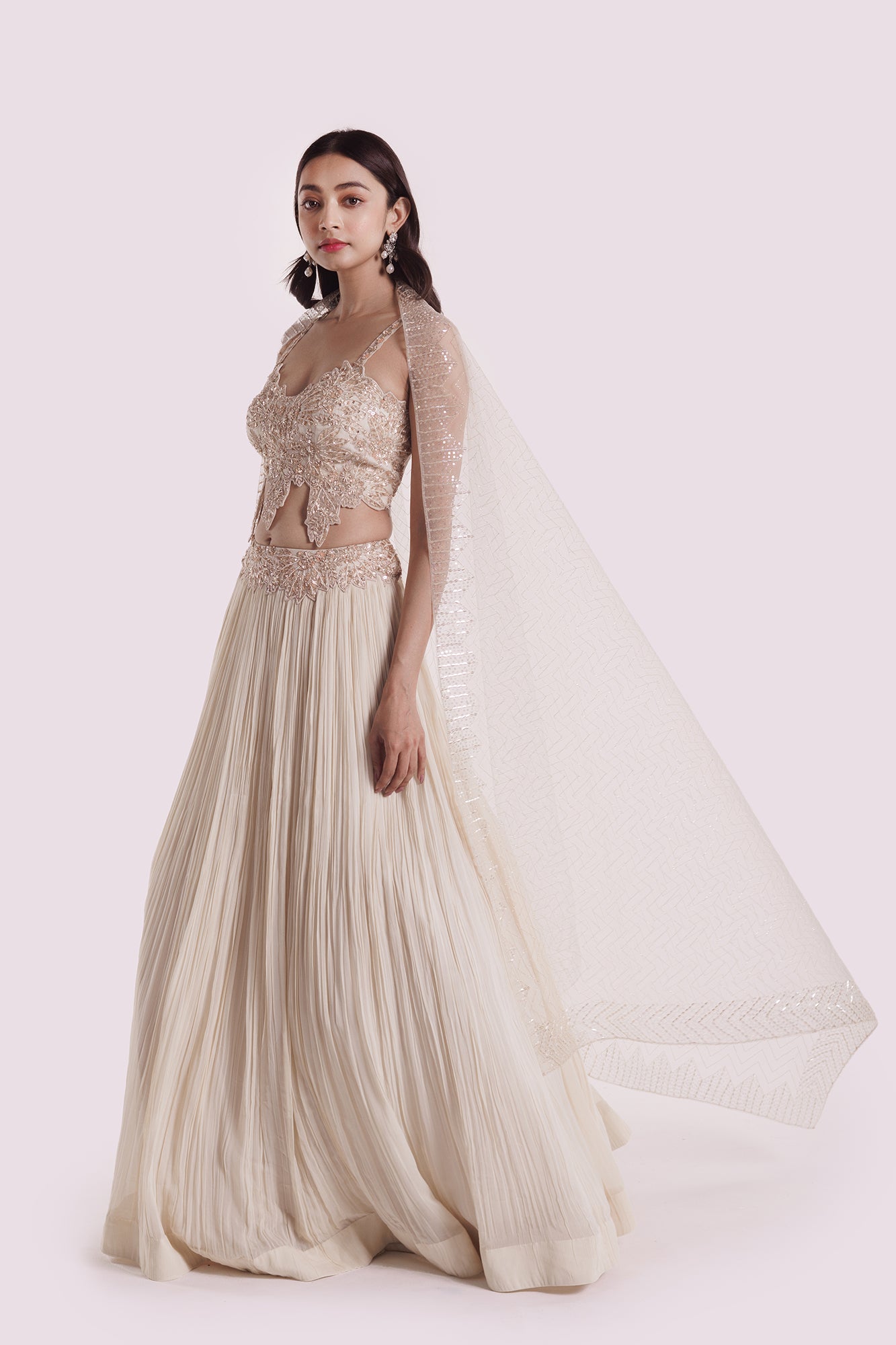 Shop ivory embroidered georgette lehenga with dupatta online in USA. Shop the best and latest designs in embroidered sarees, designer sarees, Anarkali suit, lehengas, sharara suits for weddings and special occasions from Pure Elegance Indian fashion store in USA.-lehenga