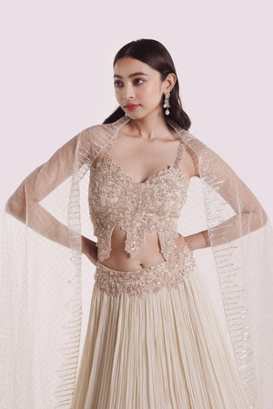 Shop ivory embroidered georgette lehenga with dupatta online in USA. Shop the best and latest designs in embroidered sarees, designer sarees, Anarkali suit, lehengas, sharara suits for weddings and special occasions from Pure Elegance Indian fashion store in USA.-closeup