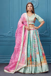 uy embroidered pastel blue lehenga with a contrasting pink gotta pati dupatta online in the USA. Featuring embroidered blouse with 3/4th sleeves blouse The Lehenga comes with a look royal at weddings and festive occasions in exquisite designer sarees, gowns, lehngas, Anarkali, and suits Pure Elegance Indian saree stores in the USA.