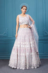 Buy this off-white lehenga with heavy floral and sequin embroidery. Dazzle on weddings and special occasions with exquisite Indian designer dresses, sharara suits, Anarkali suits, bridal lehengas, and sharara suits from Pure Elegance Indian clothing store in the USA. Shop online from Pure Elegance.