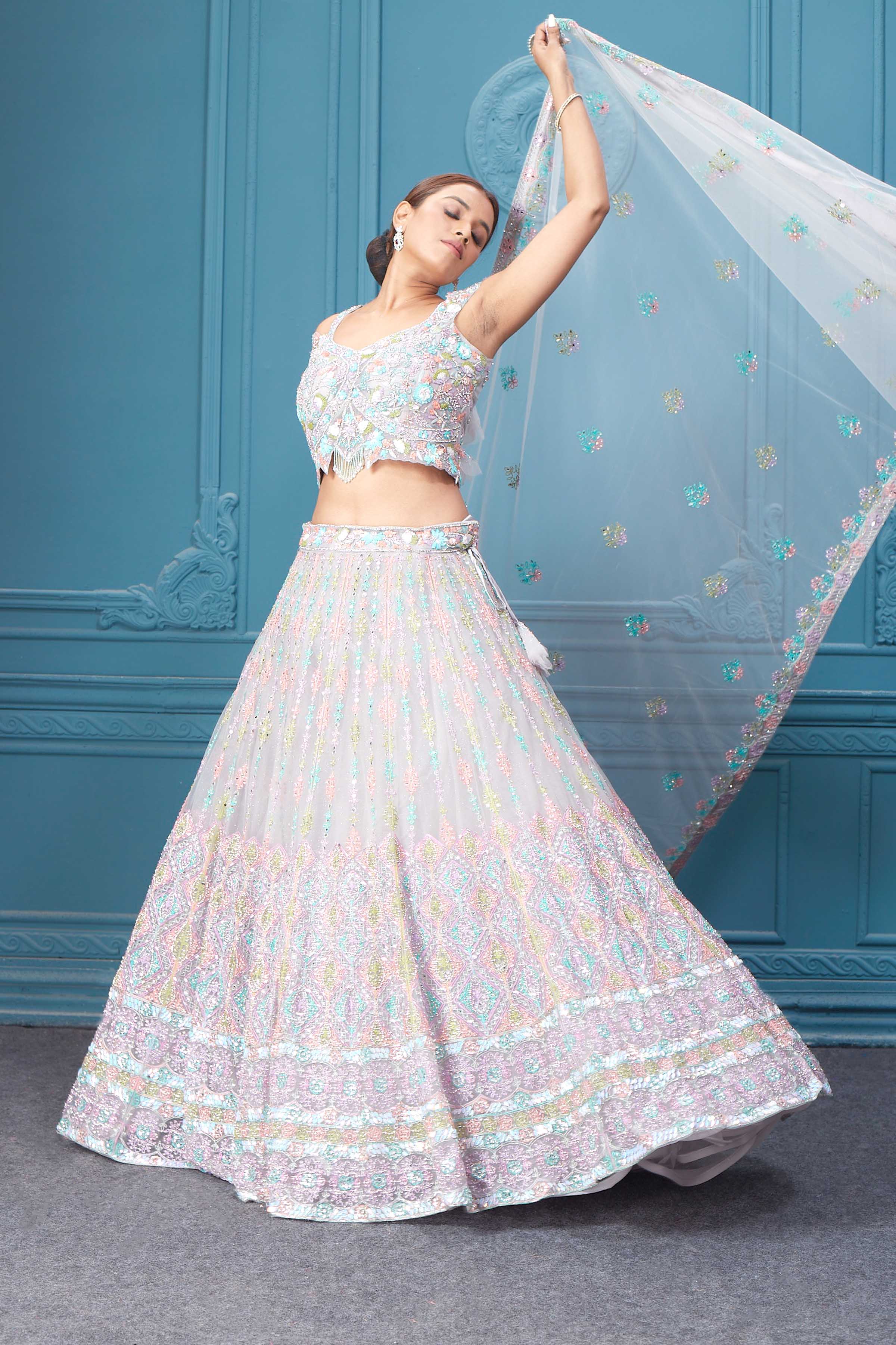 Buy this light pink lehenga with heavy multicolor sequin & mirror embroidery. Dazzle on weddings and special occasions with exquisite Indian designer dresses, sharara suits, Anarkali suits, bridal lehengas, and sharara suits from Pure Elegance Indian clothing store in the USA. Shop online from Pure Elegance.