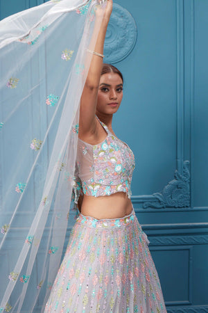 Buy this light pink lehenga with heavy multicolor sequin & mirror embroidery. Dazzle on weddings and special occasions with exquisite Indian designer dresses, sharara suits, Anarkali suits, bridal lehengas, and sharara suits from Pure Elegance Indian clothing store in the USA. Shop online from Pure Elegance.