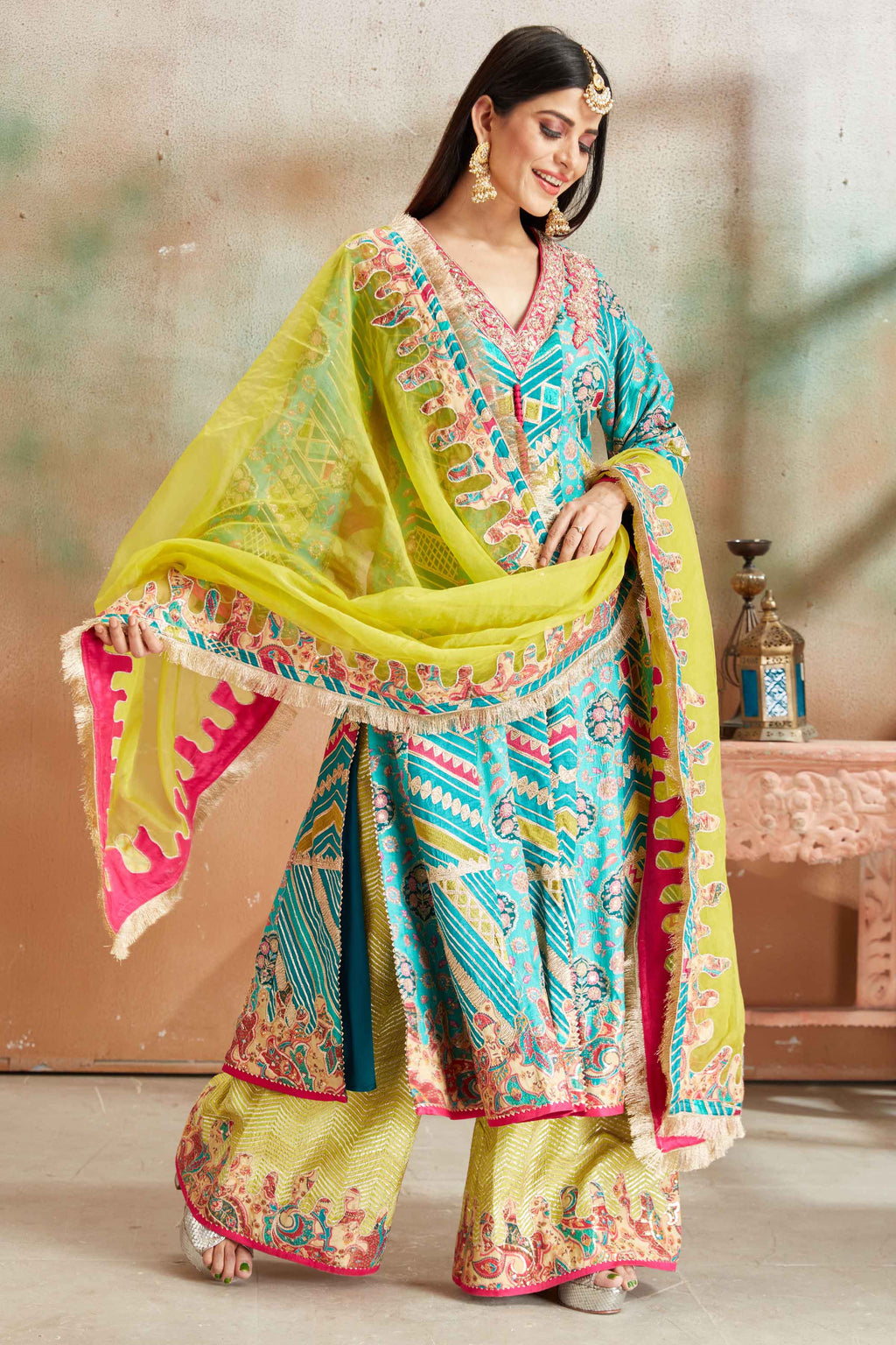 Shop blue embroidered Banarasi flared suit online in USA with green palazzo. Look your best on festive occasions in latest designer saris, pure silk sarees, Kanjivaram silk sarees, handwoven saris, tussar silk sarees, embroidered saris from Pure Elegance Indian clothing store in USA.-full view