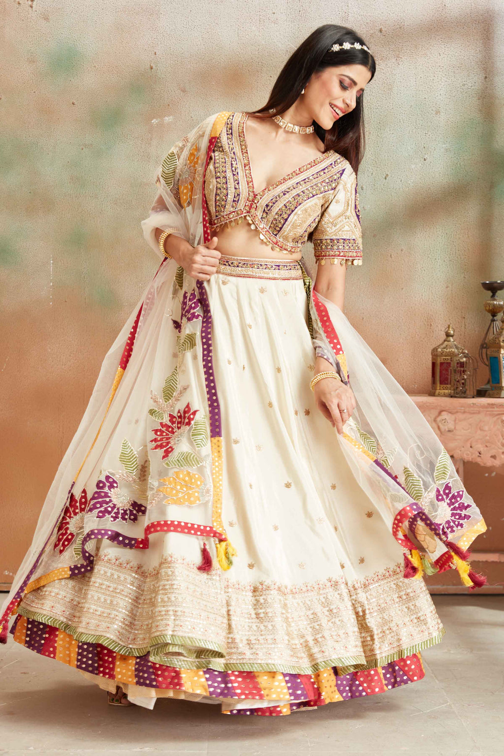 Buy cream embroidered Banarasi lehenga online in USA with multicolor border and dupatta. Look your best on festive occasions in latest designer saris, pure silk sarees, Kanjivaram silk sarees, handwoven saris, tussar silk sarees, embroidered saris from Pure Elegance Indian clothing store in USA.-full view