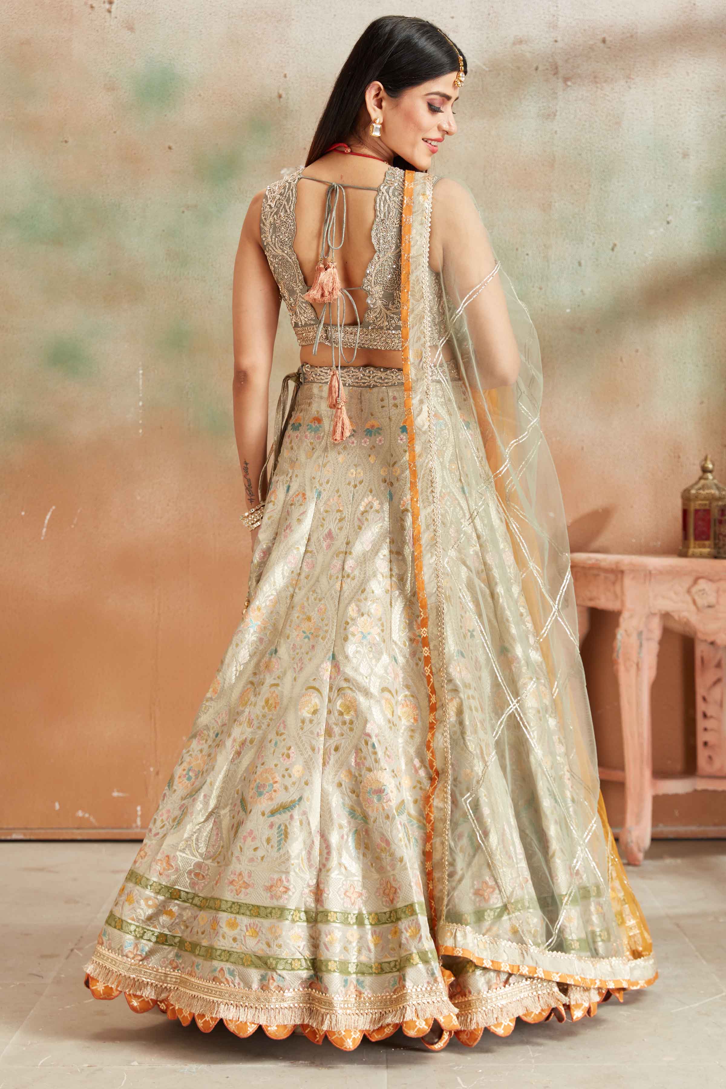 Buy sage green embroidered Banarasi silk lehenga online in USA with dupatta. Look your best on festive occasions in latest designer saris, pure silk sarees, Kanjivaram silk sarees, handwoven saris, tussar silk sarees, embroidered saris from Pure Elegance Indian clothing store in USA.-backup