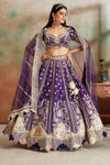 Buy purple embroidered Banarasi silk lehenga online in USA with dupatta. Look your best on festive occasions in latest designer saris, pure silk sarees, Kanjivaram silk sarees, handwoven saris, tussar silk sarees, embroidered saris from Pure Elegance Indian clothing store in USA.-full view