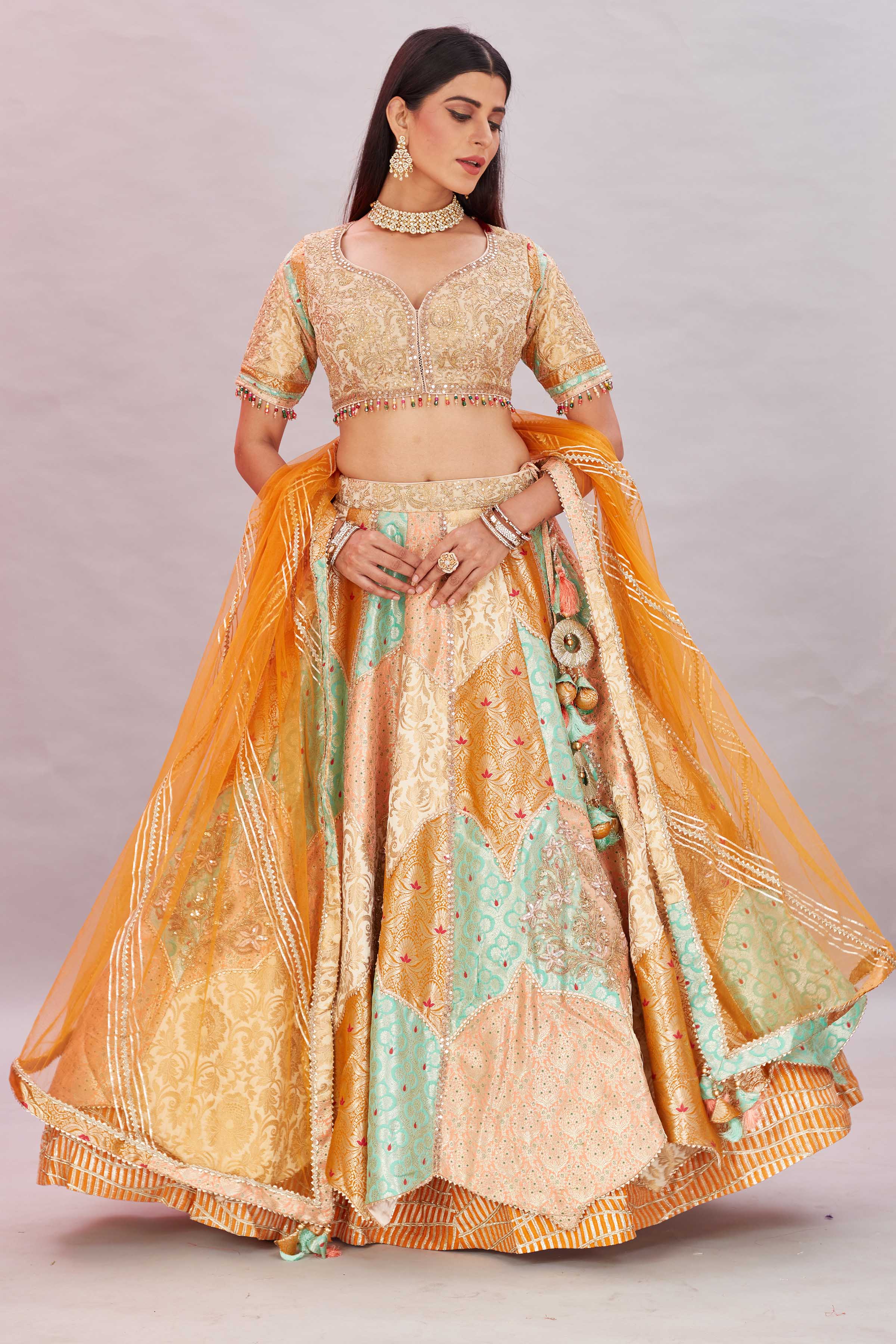 Buy multicolor peach embroidered silk lehenga sari online in USA with dupatta. Look your best on festive occasions in latest designer saris, pure silk sarees, Kanjivaram silk sarees, handwoven saris, tussar silk sarees, embroidered saris from Pure Elegance Indian clothing store in USA.-full view