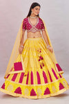 Buy magenta and yellow embroidered silk lehenga online in USA with dupatta. Look your best on festive occasions in latest designer saris, pure silk sarees, Kanjivaram silk sarees, handwoven saris, tussar silk sarees, embroidered saris from Pure Elegance Indian clothing store in USA.-full view