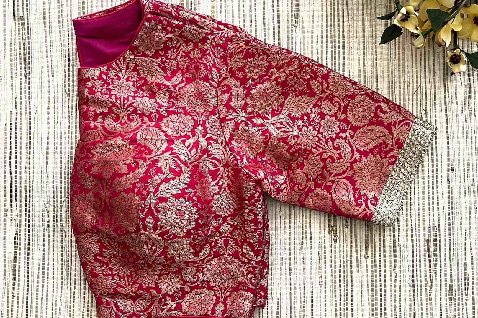 Shop dark pink Banarasi sari blouse online in USA with golden lace. Elevate your saree style with exquisite readymade sari blouses, embroidered saree blouses, Banarasi sari blouse, designer saree blouse, choli-cut blouses, corset blouses from Pure Elegance Indian fashion store in USA.-side