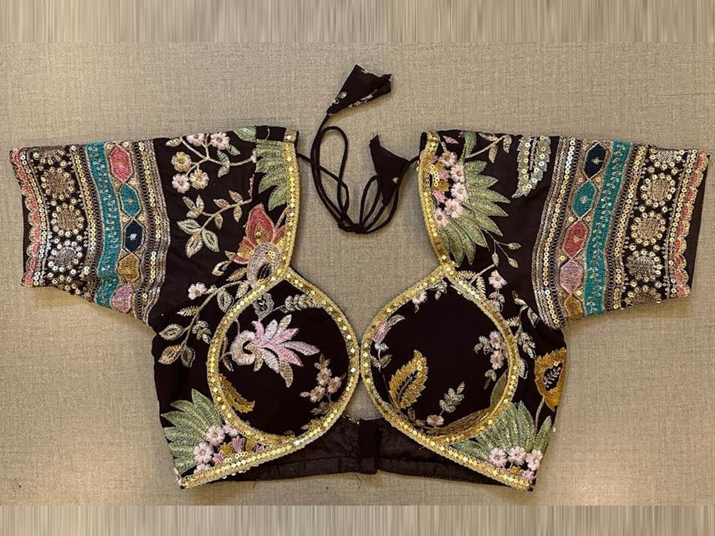 Shop black heavy embroidery designer saree blouse online in USA. Elevate your saree style with exquisite readymade sari blouses, embroidered saree blouses, Banarasi sari blouse, designer saree blouse, choli-cut blouses, corset blouses from Pure Elegance Indian fashion store in USA.-full view