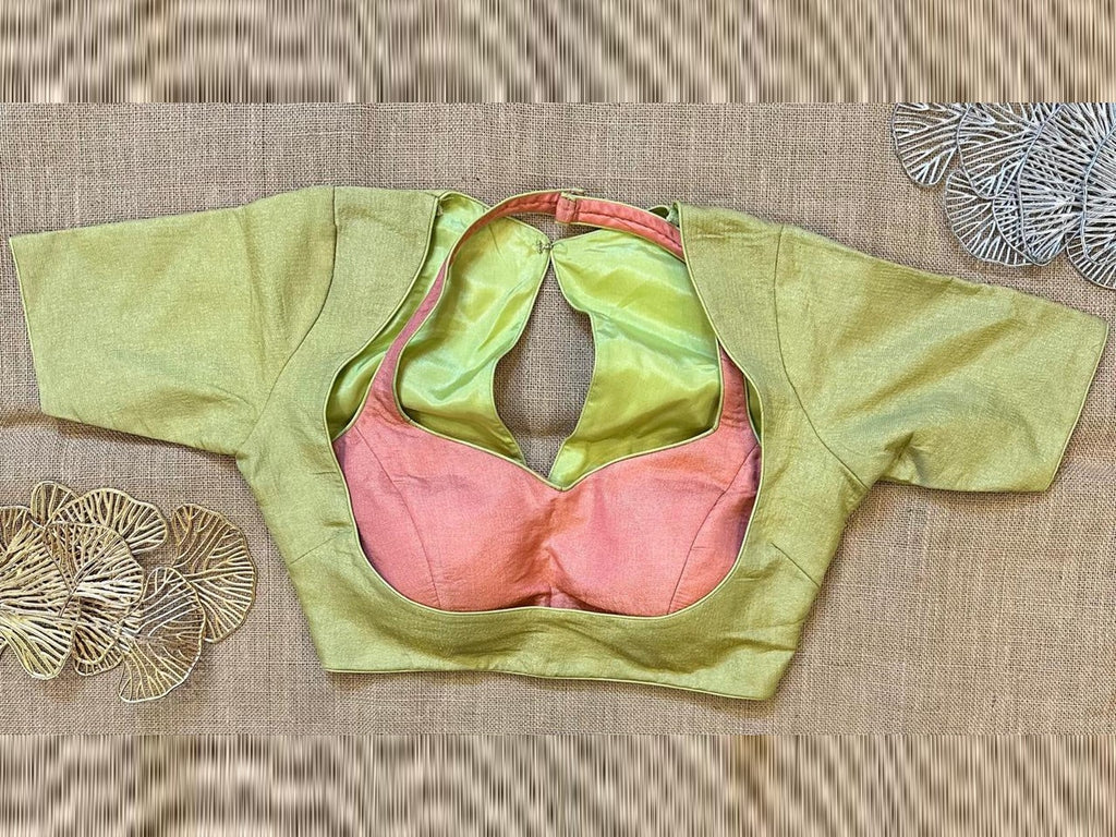 Shop lime green and pink designer saree blouse online in USA. Elevate your saree style with exquisite readymade saree blouses, embroidered saree blouses, Banarasi sari blouse, designer saree blouse, choli-cut blouses, corset blouses from Pure Elegance Indian fashion store in USA.-front