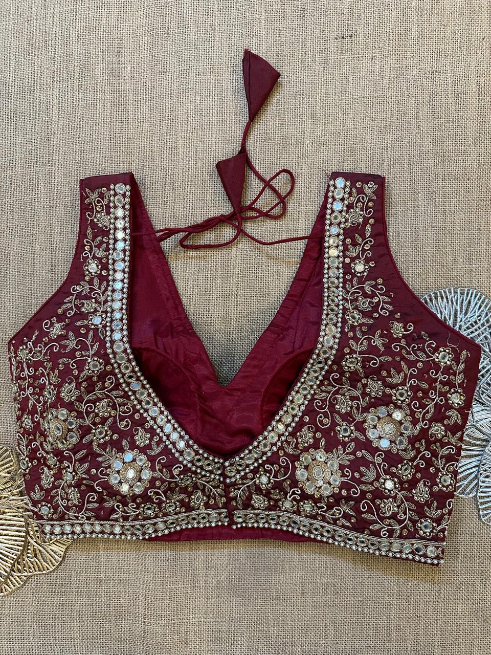 Shop maroon hand embroidered sleeveless saree blouse online in USA with pink patch sleeves. Elevate your saree style with exquisite readymade saree blouses, embroidered saree blouses, Banarasi sari blouse, designer saree blouse, choli-cut blouses, corset blouses from Pure Elegance Indian fashion store in USA.-back