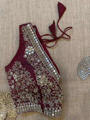 Shop maroon hand embroidered sleeveless saree blouse online in USA with pink patch sleeves. Elevate your saree style with exquisite readymade saree blouses, embroidered saree blouses, Banarasi sari blouse, designer saree blouse, choli-cut blouses, corset blouses from Pure Elegance Indian fashion store in USA.-side