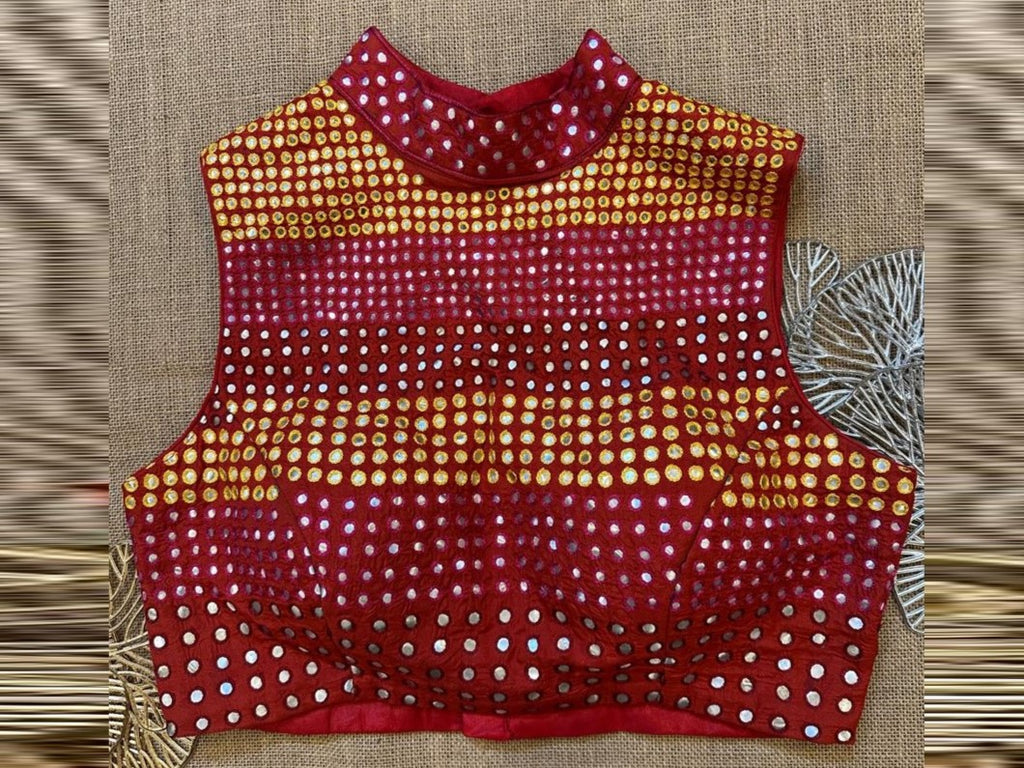 Buy red and yellow mirror work sleeveless saree blouse online in USA. Elevate your saree style with exquisite readymade saree blouses, embroidered saree blouses, Banarasi sari blouse, designer saree blouse, choli-cut blouses, corset blouses from Pure Elegance Indian fashion store in USA.-front