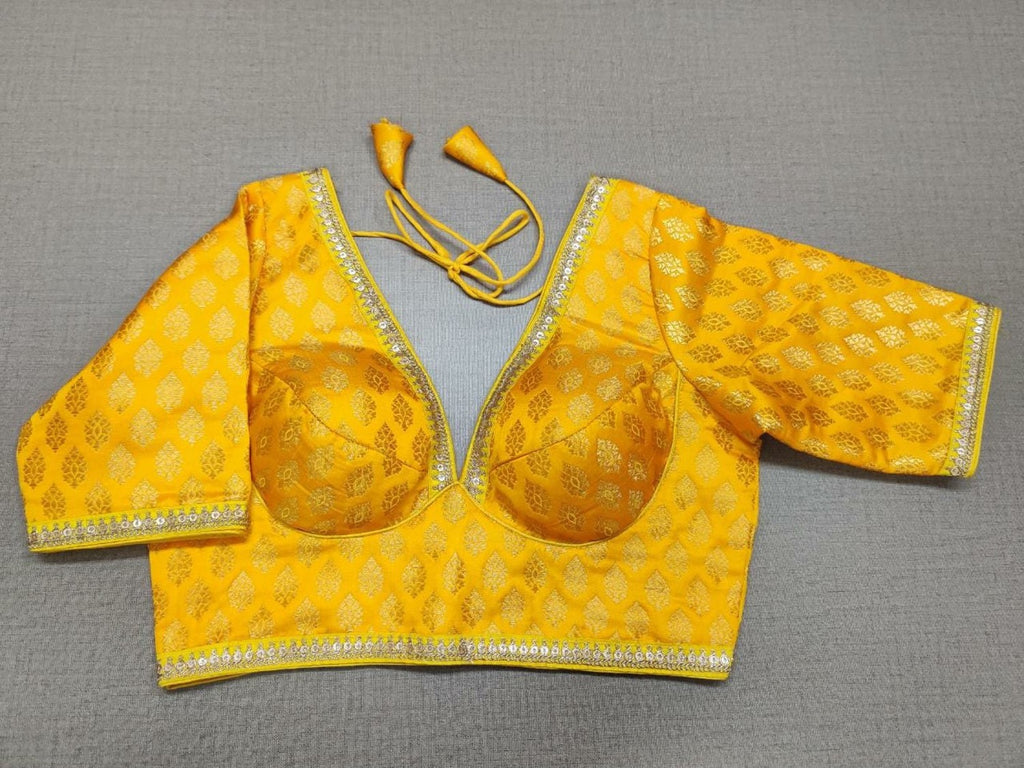 Shop yellow Banarasi saree blouse online in USA with sequin lace. Elevate your saree style with exquisite readymade saree blouses, embroidered saree blouses, Banarasi saree blouse, designer sari blouse, choli-cut blouses, corset blouses from Pure Elegance Indian fashion store in USA.-full view