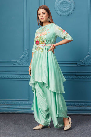 Shop Gorgeous neon green suit featuring a boat neck, quarter sleeves, and a stylish belt. Shop Indian dresses, gowns, Anarkali, lehenga, and saree online at Pure Elegance or visit our store in the USA.