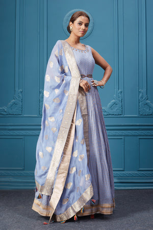 Buy a light blue embroidered sleeveless Anarkali kurta featuring embroidery, belt, and an embroidered dupatta with tassels. Dazzle on special occasions with exquisite Indian designer dresses, sharara suits, Anarkali suits, bridal lehengas, and sharara suits from Pure Elegance Indian clothing store in the USA. Shop online from Pure Elegance.