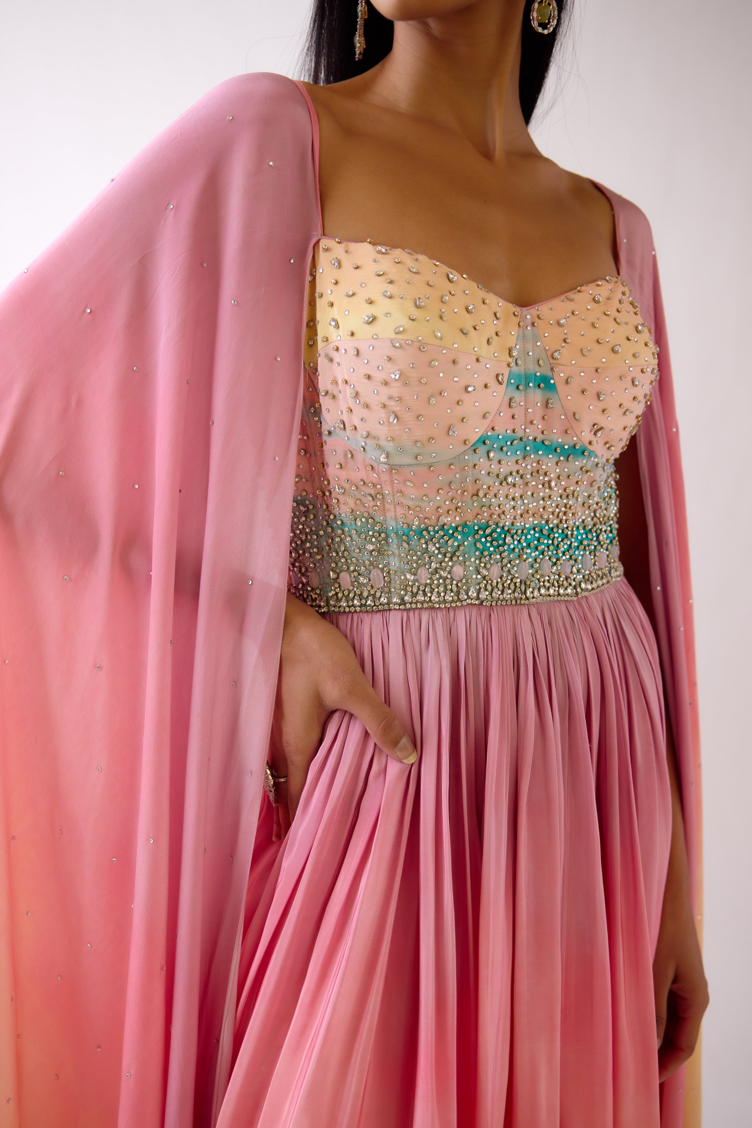 Buy light pink crepe embellished Anarkali online in USA with cape sleeves. Shop the best and latest designs in embroidered sarees, designer sarees, Anarkali suit, lehengas, sharara suits for weddings and special occasions from Pure Elegance Indian fashion store in USA-closeup