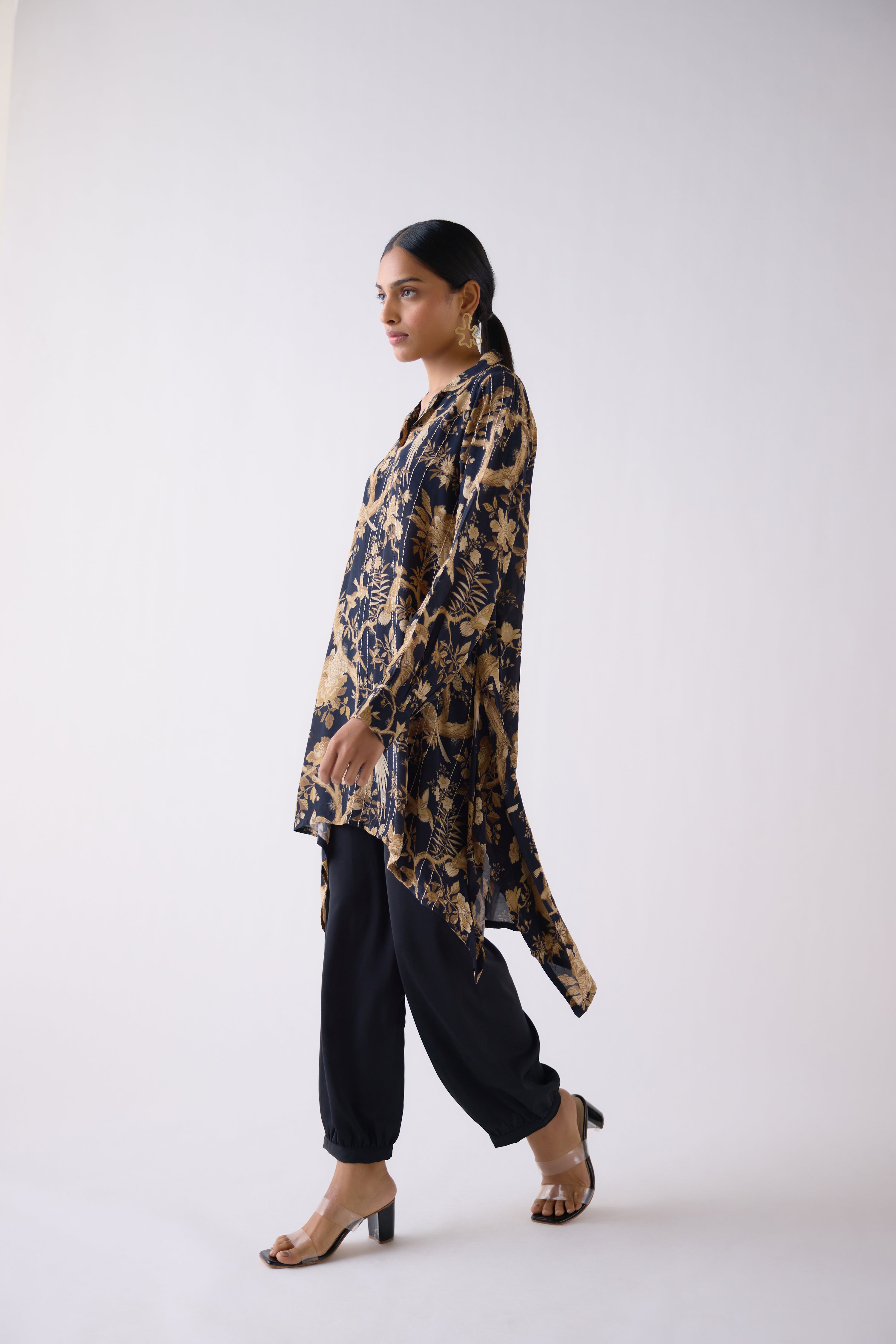 Shop black abstract print muslin co-ord set online in USA with salwar. Shop the best and latest designs in embroidered sarees, designer sarees, Anarkali suit, lehengas, sharara suits for weddings and special occasions from Pure Elegance Indian fashion store in USA.-side