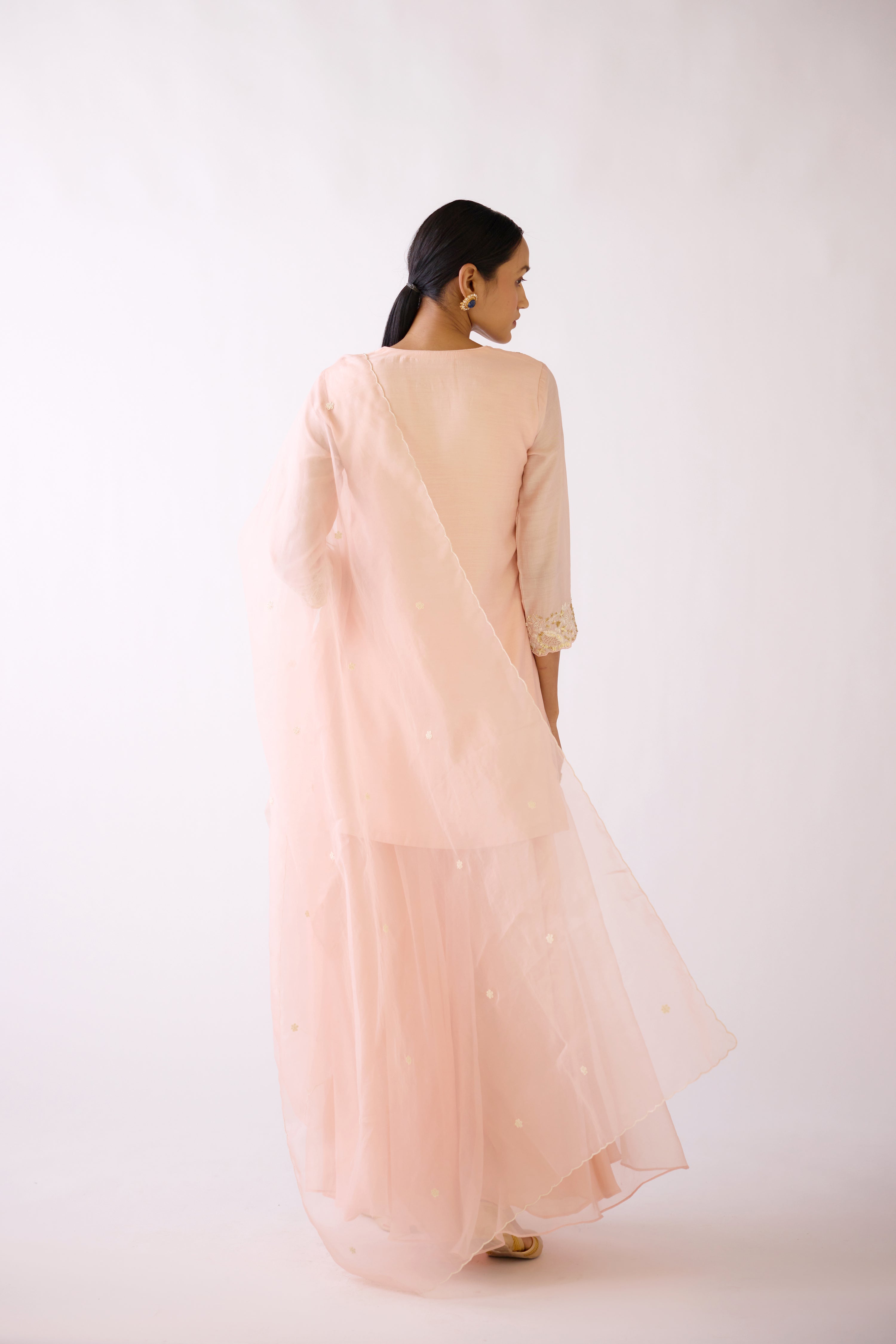 Shop baby pink embroidered cotton silk sharara suit online in USA. Shop the best and latest designs in embroidered sarees, designer sarees, Anarkali suit, lehengas, sharara suits for weddings and special occasions from Pure Elegance Indian fashion store in USA.-back