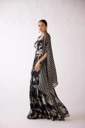 Shop black mirror work floral skirt set online in USA with cape. Shop the best and latest designs in embroidered sarees, designer sarees, Anarkali suit, lehengas, sharara suits for weddings and special occasions from Pure Elegance Indian fashion store in USA.-side