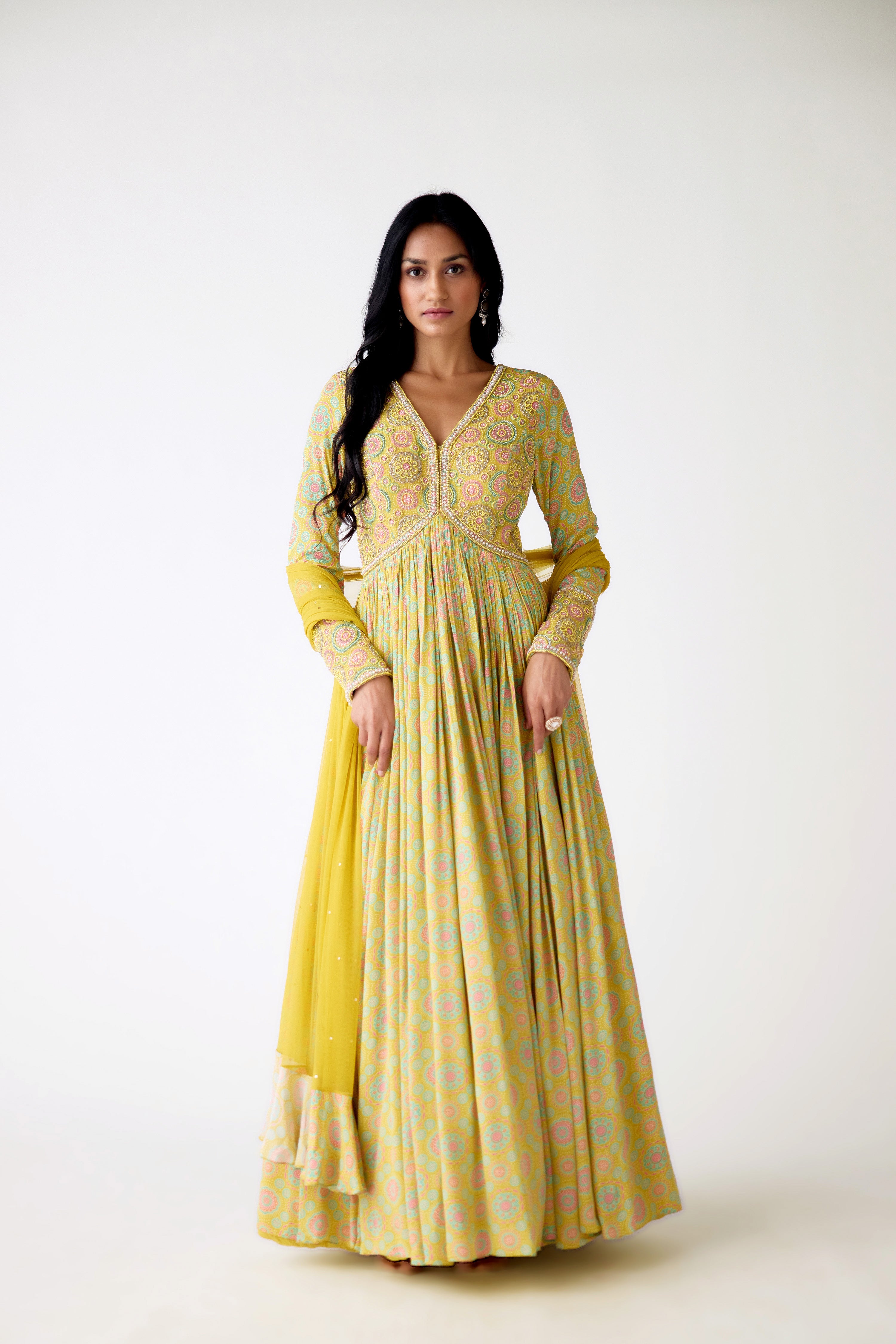 Shop yellow printed beads and sequin work crepe Anarkali online in USA. Shop the best and latest designs in embroidered sarees, designer sarees, Anarkali suit, lehengas, sharara suits for weddings and special occasions from Pure Elegance Indian fashion store in USA.-front