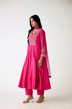 Buy rani pink embroidered chanderi Anarkali suit online in USA. Shop the best and latest designs in embroidered sarees, designer sarees, Anarkali suit, lehengas, sharara suits for weddings and special occasions from Pure Elegance Indian fashion store in USA.-side