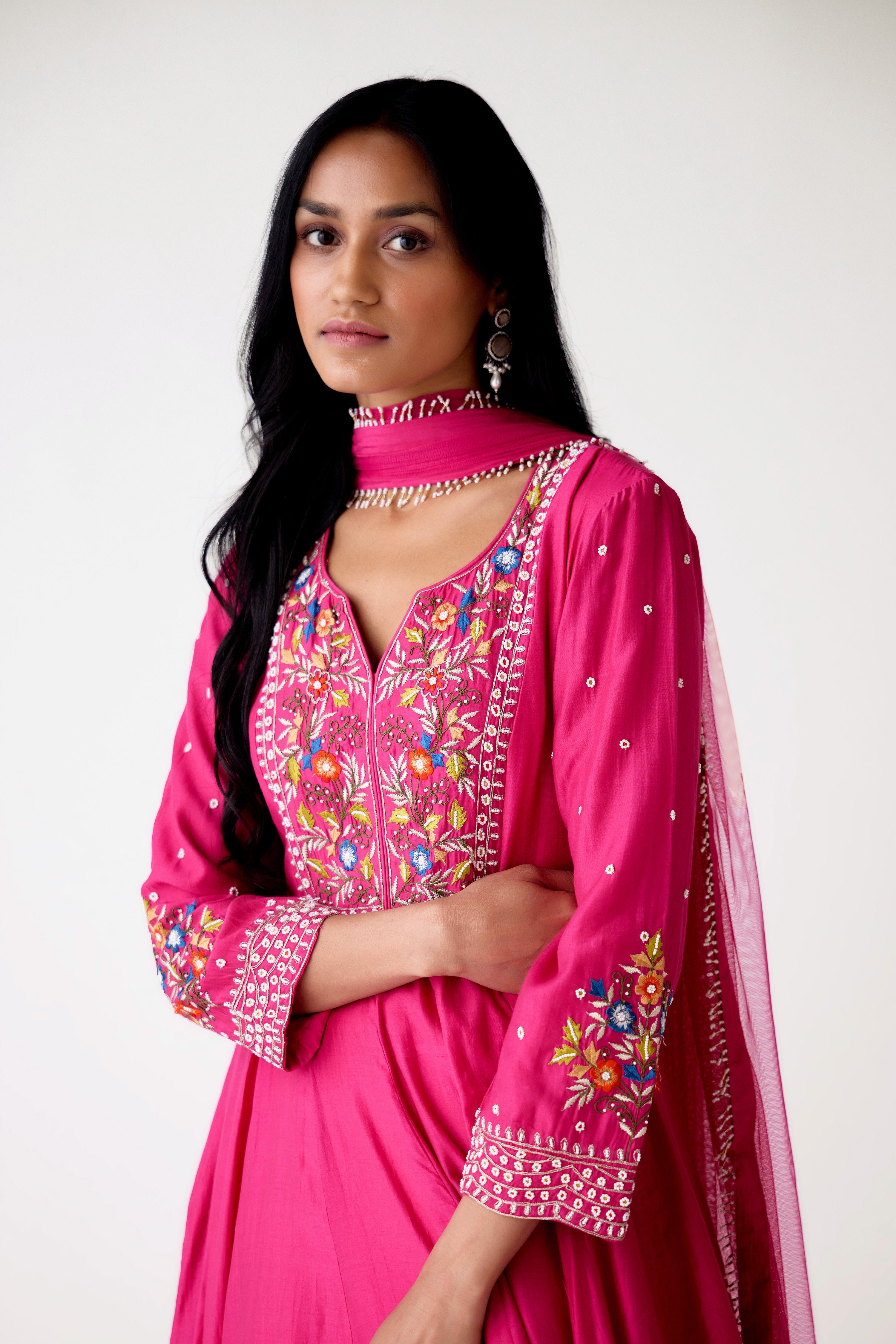 Buy rani pink embroidered chanderi Anarkali suit online in USA. Shop the best and latest designs in embroidered sarees, designer sarees, Anarkali suit, lehengas, sharara suits for weddings and special occasions from Pure Elegance Indian fashion store in USA.-closeup