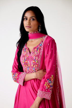 Buy rani pink embroidered chanderi Anarkali suit online in USA. Shop the best and latest designs in embroidered sarees, designer sarees, Anarkali suit, lehengas, sharara suits for weddings and special occasions from Pure Elegance Indian fashion store in USA.-closeup