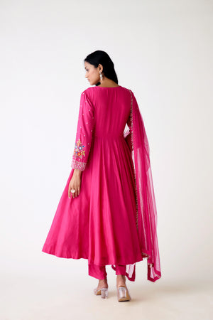 Buy rani pink embroidered chanderi Anarkali suit online in USA. Shop the best and latest designs in embroidered sarees, designer sarees, Anarkali suit, lehengas, sharara suits for weddings and special occasions from Pure Elegance Indian fashion store in USA.-back