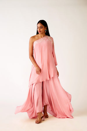 Buy baby pink embroidered asymmetric georgette co-ord set online in USA. Shop the best and latest designs in embroidered sarees, designer sarees, Anarkali suit, lehengas, sharara suits for weddings and special occasions from Pure Elegance Indian fashion store in USA.-front