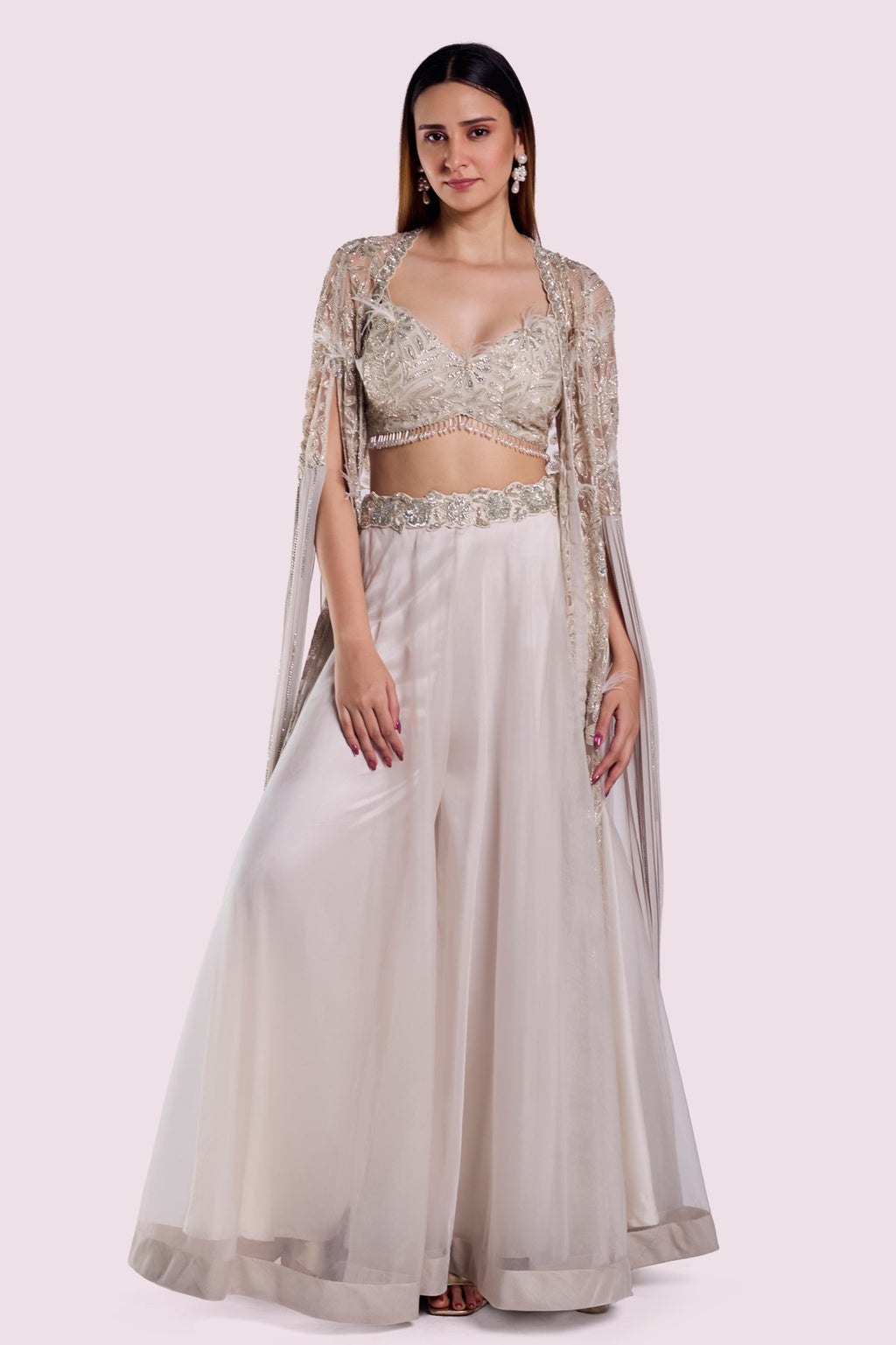 Buy stunning ivory embroidered net skirt set online in USA with cape. Shop the best and latest designs in embroidered sarees, designer sarees, Anarkali suit, lehengas, sharara suits for weddings and special occasions from Pure Elegance Indian fashion store in USA.-full view