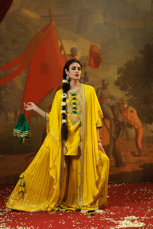 Buy mango yellow georgette chiffon sharara suit online in USA with cape. Shop the best and latest designs in embroidered sarees, designer sarees, Anarkali suit, lehengas, sharara suits for weddings and special occasions from Pure Elegance Indian fashion store in USA.-sharara