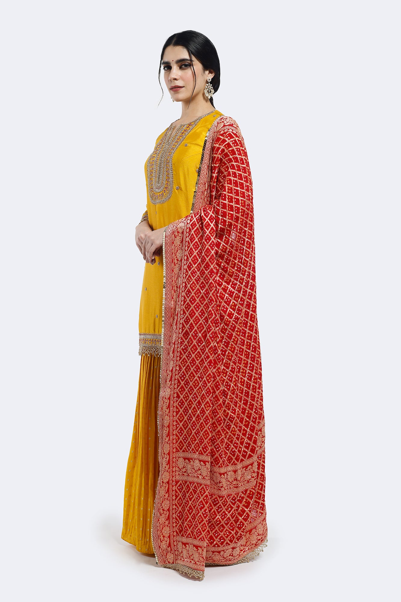 Buy yellow embroidered silk gharara suit online in USA with pink dupatta. Shop the best and latest designs in embroidered sarees, designer sarees, Anarkali suit, lehengas, sharara suits for weddings and special occasions from Pure Elegance Indian fashion store in USA.-dupatta