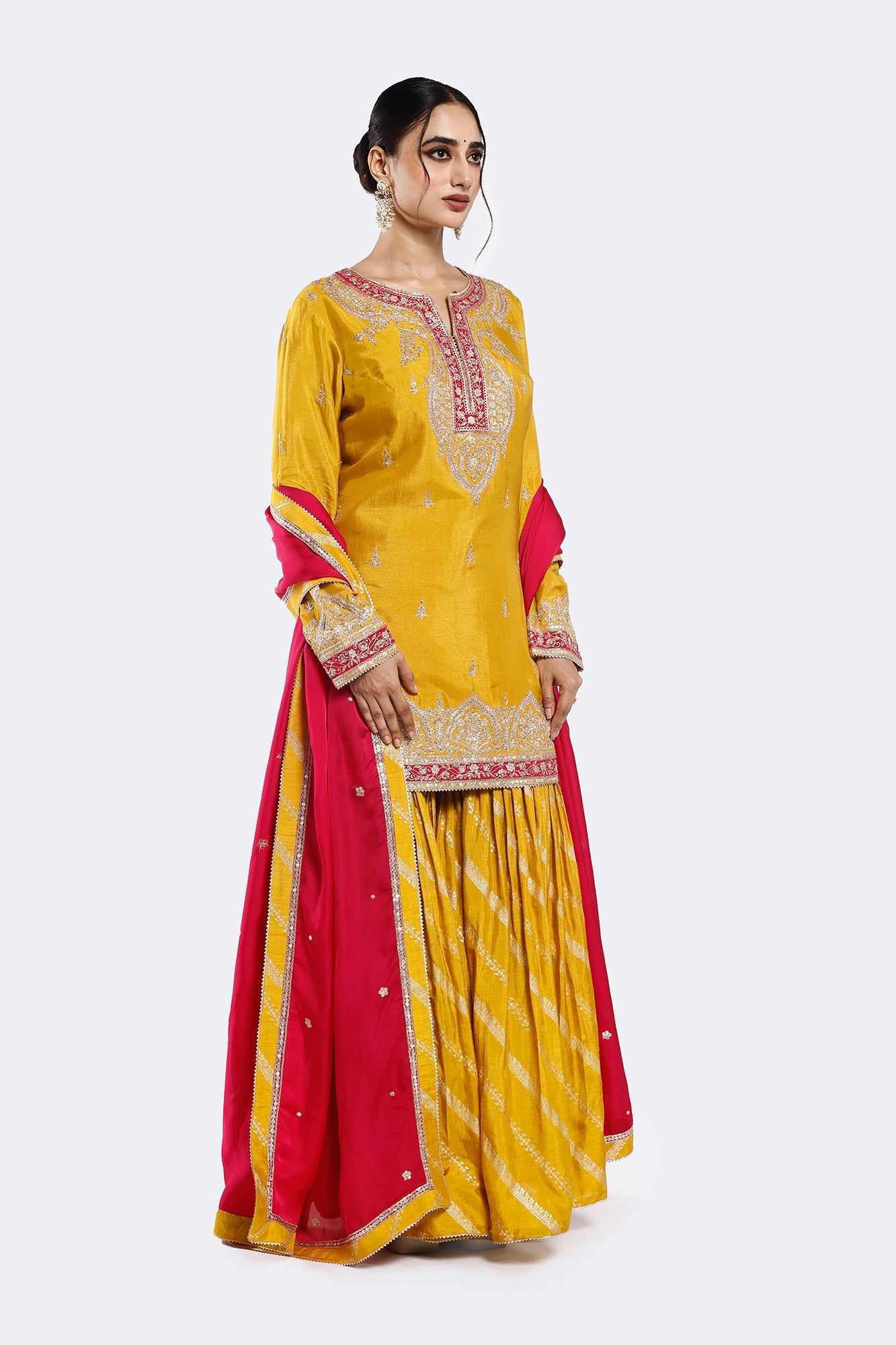 Shop yellow embroidered organza satin gharara suit online in USA with pink dupatta. Shop the best and latest designs in embroidered sarees, designer sarees, Anarkali suit, lehengas, sharara suits for weddings and special occasions from Pure Elegance Indian fashion store in USA.-suit