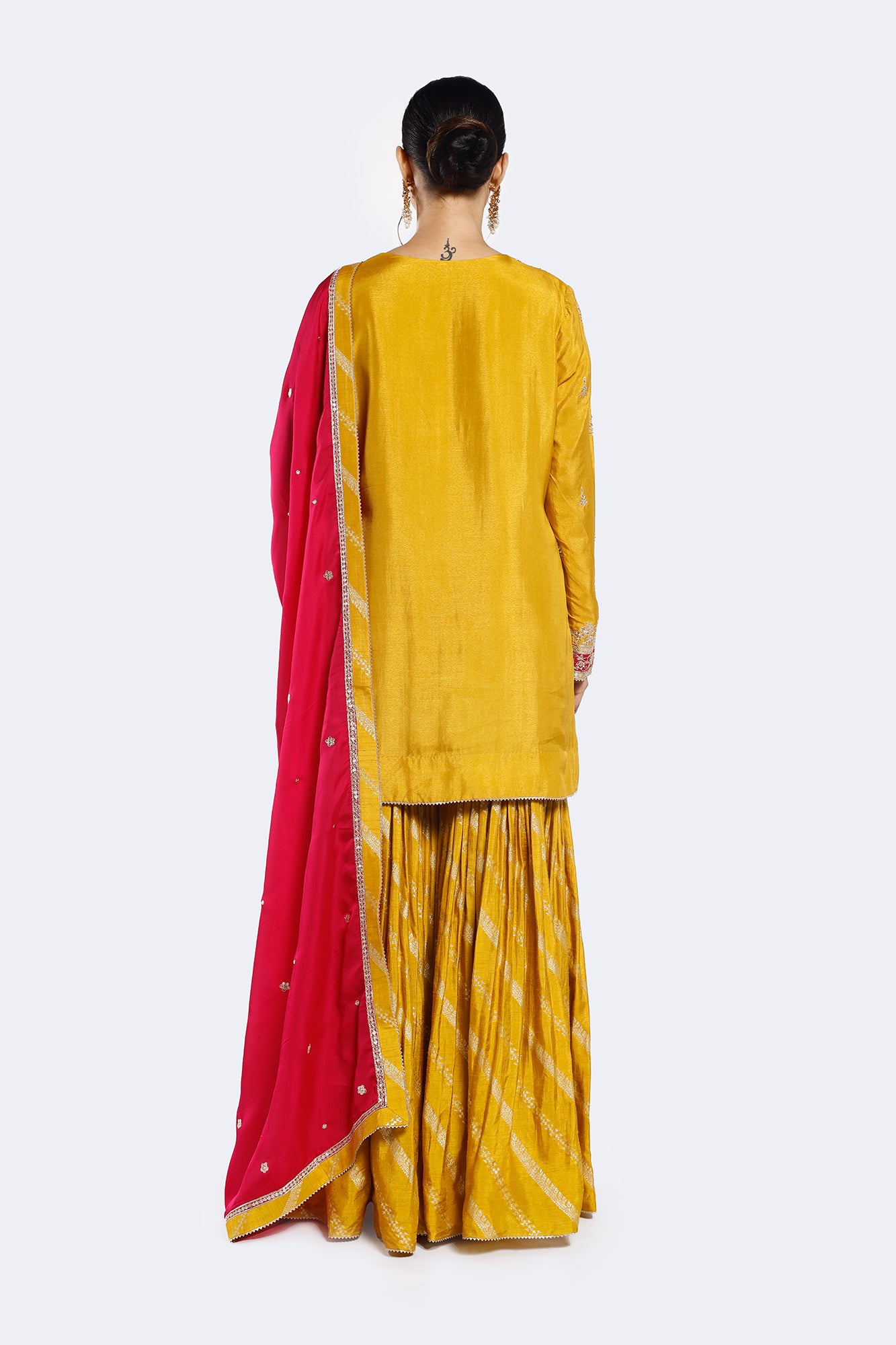 Shop yellow embroidered organza satin gharara suit online in USA with pink dupatta. Shop the best and latest designs in embroidered sarees, designer sarees, Anarkali suit, lehengas, sharara suits for weddings and special occasions from Pure Elegance Indian fashion store in USA.-back