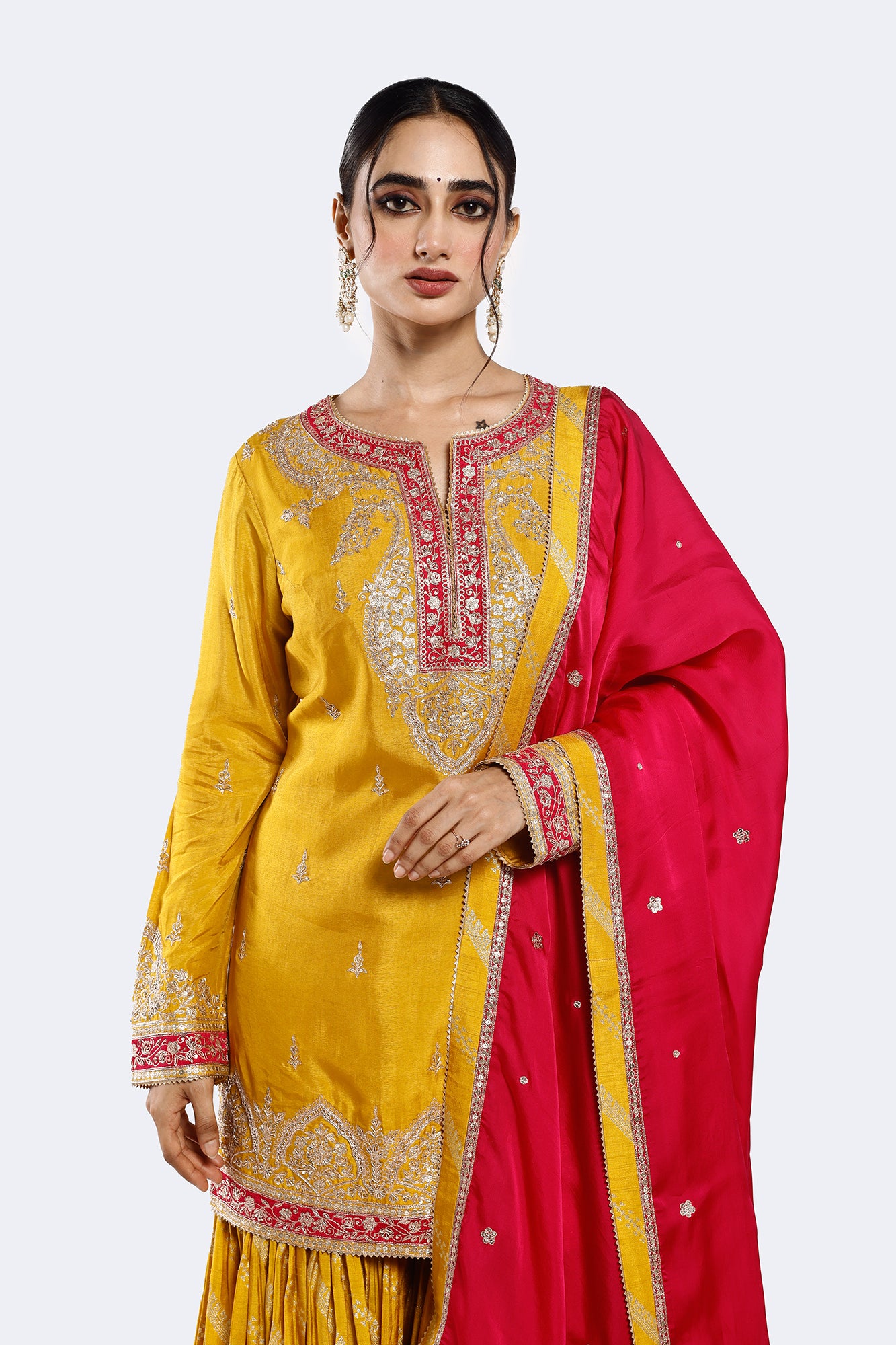 Shop yellow embroidered organza satin gharara suit online in USA with pink dupatta. Shop the best and latest designs in embroidered sarees, designer sarees, Anarkali suit, lehengas, sharara suits for weddings and special occasions from Pure Elegance Indian fashion store in USA.-closeup