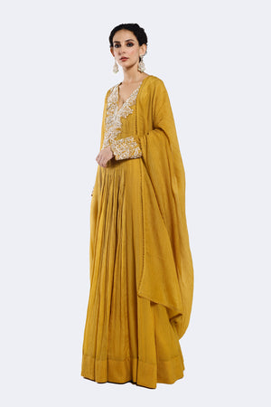 Buy mustard embroidered crushed Anarkali suit online in USA with dupatta. Shop the best and latest designs in embroidered sarees, designer sarees, Anarkali suit, lehengas, sharara suits for weddings and special occasions from Pure Elegance Indian fashion store in USA.-side