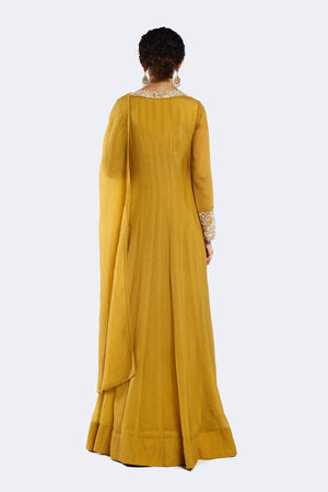 Buy mustard embroidered crushed Anarkali suit online in USA with dupatta. Shop the best and latest designs in embroidered sarees, designer sarees, Anarkali suit, lehengas, sharara suits for weddings and special occasions from Pure Elegance Indian fashion store in USA.-back