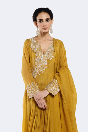 Buy mustard embroidered crushed Anarkali suit online in USA with dupatta. Shop the best and latest designs in embroidered sarees, designer sarees, Anarkali suit, lehengas, sharara suits for weddings and special occasions from Pure Elegance Indian fashion store in USA.-closeup