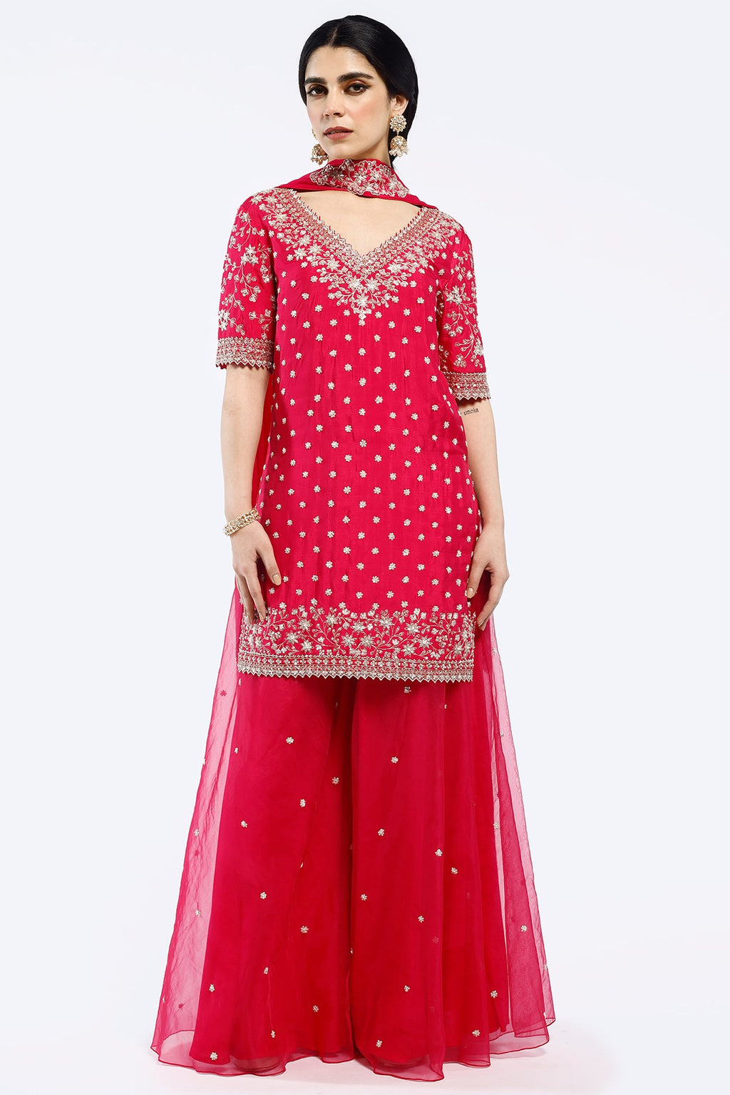 Shop rani pink embroidered organza sharara suit online in USA with dupatta. Shop the best and latest designs in embroidered sarees, designer sarees, Anarkali suit, lehengas, sharara suits for weddings and special occasions from Pure Elegance Indian fashion store in USA.-full view